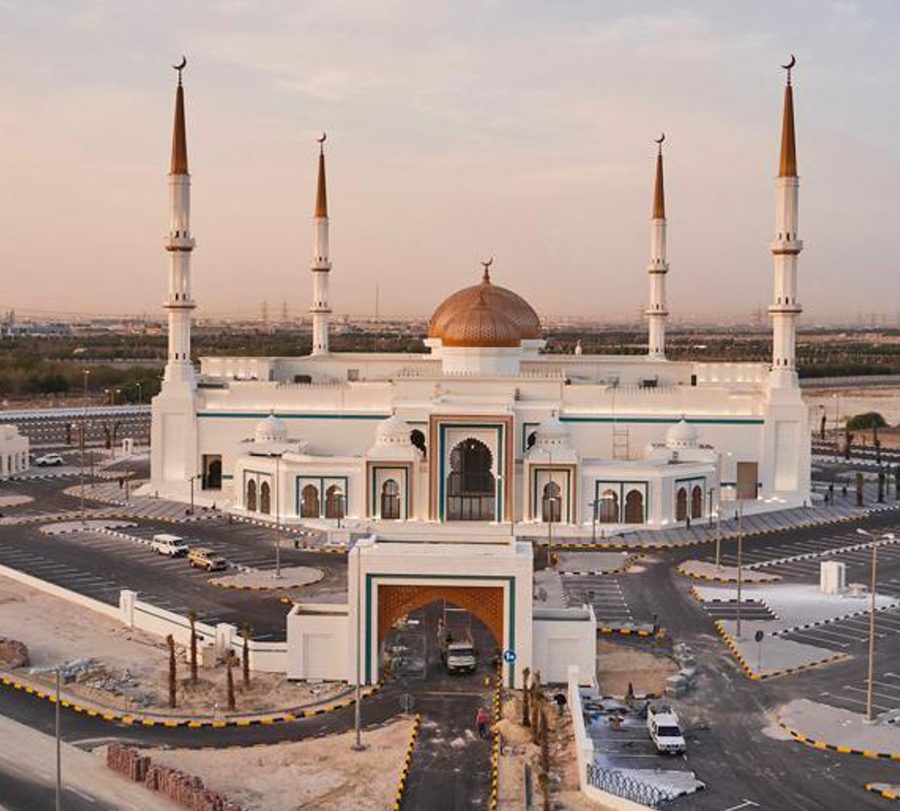 Sulaibikhat Mosque at dusk: the dome, four minarets and the entrance gate