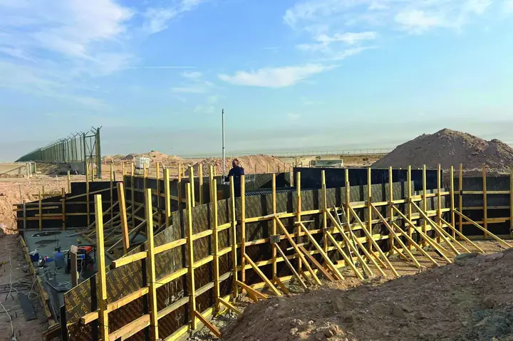 Formwork and a cleared trench at the Um Al Aish site.